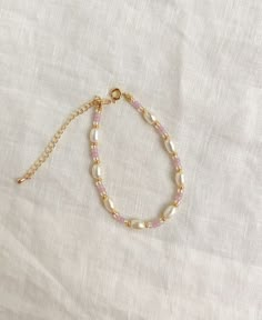 Pink Beaded Bracelets Aesthetic, Handmade Dainty Pearl White Bracelets, Handmade Dainty Pearl Bracelet With Round Beads, Dainty Beaded Pearl Bracelet, Handmade Delicate Pearl Bracelets, Handmade Dainty Pearl Beaded Bracelets, Pink Pearl Jewelry With Tiny Beads, Delicate Handmade Pearl Bracelets, Dainty Handmade Pearl Beaded Bracelets