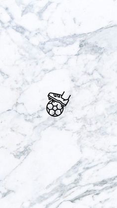 a white marble surface with a black sticker on it