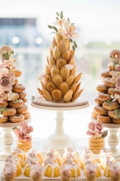 there are many pastries on the table and one is decorated like a pineapple