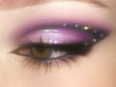 Purple Makeup Looks Euphoria, Purple Glitter Hair, Purple Makeup Eyeshadow, Space Makeup Aesthetic, Lavender Makeup Aesthetic, Iridescent Makeup Looks Prom, Purple Makeup Looks With Rhinestones, Purple Star Makeup, Purple Glam Makeup Looks