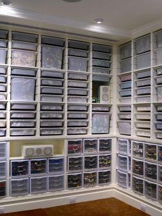 a room filled with lots of drawers and bins