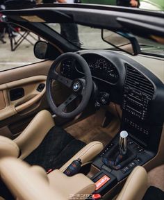 the interior of a bmw sports car