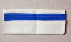 a piece of cloth with blue and white stripes