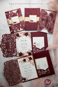 red and gold wedding stationery with flowers on it