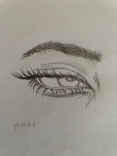 a pencil drawing of an eye with long lashes