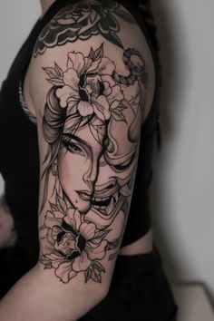 a woman with flowers on her arm