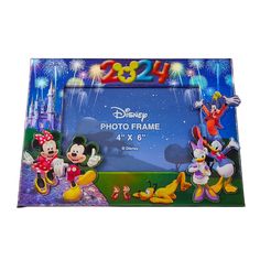 an image of mickey mouse and friends with fireworks in the sky behind them on a photo frame