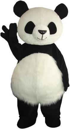 a large panda bear standing up with its arms in the air