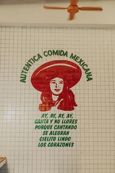 a sign on the side of a building that says, mexican comida mexicana