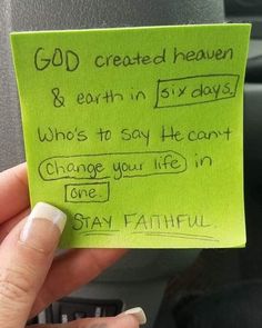 someone is holding up a green piece of paper that says god created heaven & earth in pix days