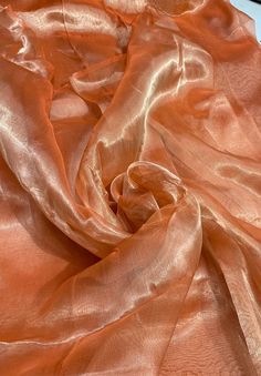 Metallic  tissue organza  Orange color  100% Silk Organza 45" wide. Usable for Apparel and interior designing. Silk Route, Silk Chiffon Fabric, French Silk, Peach Fuzz, Interior Designing, Organza Fabric, Orange Fabric, Silk Organza, Gorgeous Fabrics