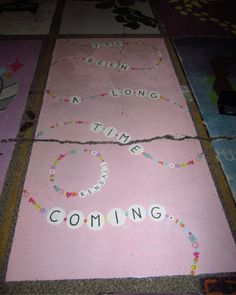 a pink rug with the words time coming written on it