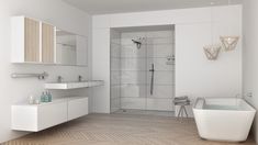 a white bathroom with a tub, sink and shower stall in it's corner