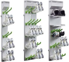 two white shelves with green handles and spoons on them, each holding different types of utensils