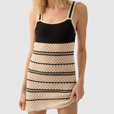 Crochet Striped Mini Dress In Black And Tan | Vacation Dress | This Crochet Striped Mini Dress Combines A Striking Black And Tan Design With A Lightweight, Breathable Fabric Perfect For Your Next Vacation. Expertly Crafted For Comfort And Style, This Dress Is Sure To Make A Statement And Keep You Feeling Cool And Fashionable All Day Long. Knit Summer Dress, Ivory Dress, Striped Skirt, Vacation Dress, Ivory Dresses, Striped Mini Dress, Trendy Chic, Straight Neckline, Vacation Dresses