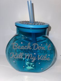 a blue glass jar that says beach don't kill my vibe