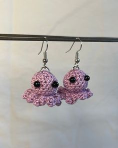 Mini crocheted octopus earrings to keep you company. They are lightweight, hypoallergenic, and noise free!  (NOTE that because they are handmade, earrings will NOT be exactly the same size/coloring as the photos) <3 Crochet Fish Earrings, Crochet Jellyfish Earrings, Crochet Small Octopus, Squid Earrings, Mini Octopus Crochet, Crocheted Octopus, Purple Octopus, Octopus Earrings, Crochet Octopus