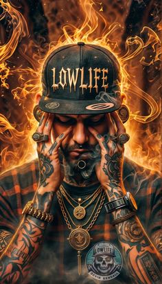 a man with tattoos and a hat on his head is holding his hands to his face