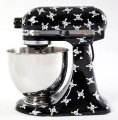 a black and white skull and crossbones pattern on an artisan stand mixer