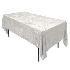 a white table cloth with black metal legs