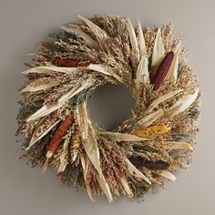 a dried wreath hanging on the wall