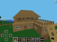 an image of a house in the minecraft style with lots of wood on it