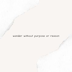 the words wander without purpose or reason are written on torn white paper with black ink