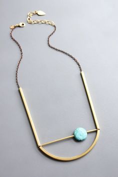 22" geometric necklace with turquoise and brass. 3 inch extender. Gold Adjustable Minimalist Turquoise Necklace, Minimalist Adjustable Gold Turquoise Necklace, Adjustable Minimalist Gold Necklace, Modern Brass Necklace, Adjustable Turquoise Brass Necklace, Modern Turquoise Metal Jewelry, Modern Bronze Brass Necklace, Turquoise Brass Jewelry, Geometric Necklace