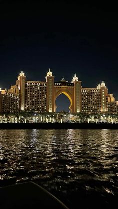 an image of a city at night from the water