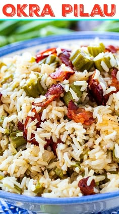 a bowl filled with rice and vegetables on top of a blue and white checkered table cloth