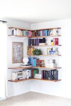 an empty room with bookshelves full of books