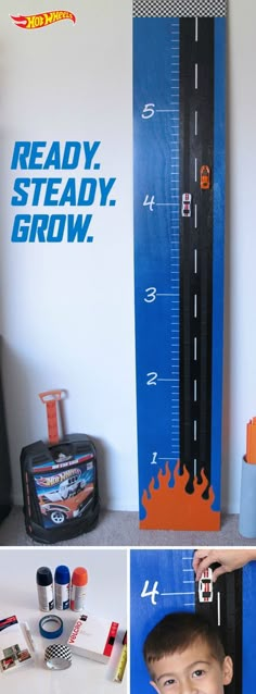 a boy is standing in front of a growth chart