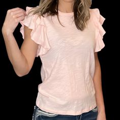 Add A Little Flattery To Your Style With This Super Cute, Flirty, Pale Pink Tee! This Tee Features A Little Romantic Flouncy Ruffle On Its Sleeve. Love Them Or Hate Them, Ruffles Are In! Description: Self: 100% Cotton Total Length: 25" | Bust 17 1/2" | Shoulder 13" Cute Flirty, How To Fold Sleeves, Boutique Tops, Pink Tee, Pink Ruffle, Grey Shorts, Sleeve Detail, Corset Top, V Neck Tops