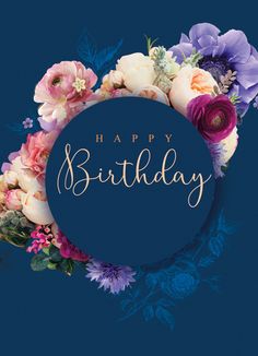 a blue birthday card with flowers and the words happy birthday in gold lettering on it