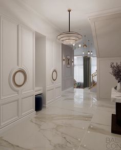 an elegant hallway with marble floors and white walls