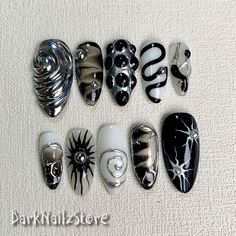 Custom Black Press On Nails, Gothic Punk Rock Nails, Snake Goth White Y2K Press On Nails bring a touch of nostalgia and futuristic style to your fingertips. With a wide range of colors, designs, and finishes, these press on nails allow you to express your individuality and stay on top of the latest trends. Whether you prefer bold and vibrant shades or subtle and sophisticated designs, DarkNailz press on nails offer endless possibilities for creating your desired look. [PLEASE READ BEFORE PURCHASING] All sets are made with GEL nail polish. These nails are reusable, if you take it off right. For instruction, please message me. Each set comes with 10 handmade press on nails, double-side gel nail glue, a mini buffer, a cuticle stick, a prep pad. 1. Measurements Please measure your own nail and Nails With Gel Designs, Medium Length Goth Nails, Press On Nails Goth, Dystopian Nails, Dark Core Nails, Christmas Nails Alternative, White Silver And Black Nails, Smokey Black Nails, Gothic Nails With Charms