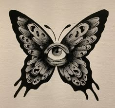 a drawing of a butterfly with an eye on it