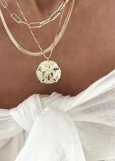 Mini Sand Dollar Necklace | James Michelle Jewelry Sand Dollar Necklace, Surf Jewelry, 2024 Wishlist, Fancy Jewelry Necklace, Beaded Jewelry Designs, Jewelry Accessories Ideas, Classy Jewelry, Jewelry Lookbook, Handcrafted Necklace