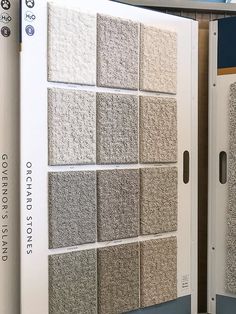 the inside of a door with carpet tiles on it