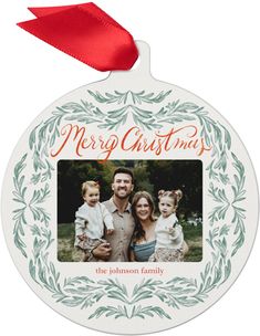 a christmas ornament with an image of a family