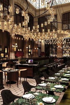 a dimly lit bar with stools and bottles on the shelves