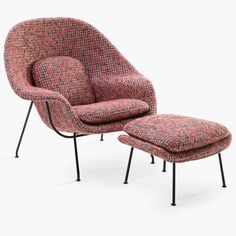 an upholstered chair and footstool are shown in red tweed with black metal legs