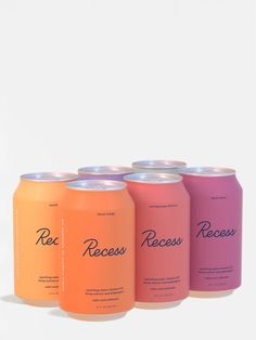 four cans of beer with the word recess on them