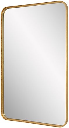 a gold framed mirror on a white background