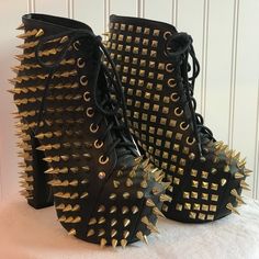 Black And Gold Jeffrey Campbell Lita Spike. Worn Only 1 Time. No Spikes Missing. I Do Not Have The Original Box, Dust Bag Or Extra Spikes. Size 5. Black Punk Round Toe Heels, Black Punk Style Heels With Round Toe, Punk Lace-up Heels For Party, Punk Lace-up Party Heels, Punk Style Lace-up Party Heels, Punk Heels With Spikes And Round Toe, Punk Spiked Round Toe Heels, Punk Style Spiked Round Toe Heels, Black Heels With Rivets For Party