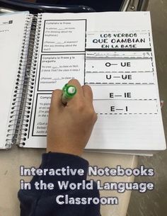 a person writing in a notebook with the title interactive notebooks in the world language classroom