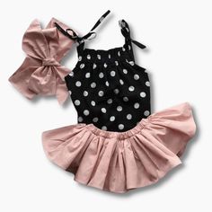 This outfit makes your warm summer day fun and breathable. It is soft and very comfortable to wear. It has a ribbon strap and stretchable. It comes with a 3 closure button for easy wear and pair with plain pink skirts that best match to black polka dots romper and pink ribbon. Have fun while wearing this stylish summer outfit. Material: Cotton Cotton Polka Dot Sets For Summer, Polka Dot Cotton Sets For Spring, Spring Cotton Sets With Polka Dot, Spring Cotton Polka Dot Sets, Spring Polka Dot Cotton Sets, Spring Cotton Sets In Polka Dot, Black Summer Sets For Playwear, Cute Polka Dot Summer Sets, Casual Polka Dot Sets For Spring