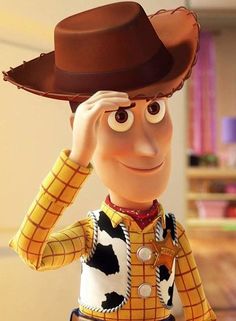 the toy story character woody from toy story is holding his hand up to his face