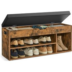 a wooden shoe rack filled with shoes