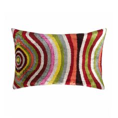 a multicolored rectangular pillow with an abstract design on the front and back side